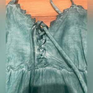 Miho’s Teal lace-up sundress with embroidered eyelet hem small spaghetti straps